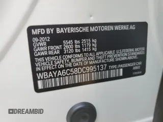 2013 BMW 7 Series 740i with VIN WBAYA6C58DC995137, listed as a Copart auction lot 75774104 with 61,847 mi miles and Salvage Title. Bid and sale history available at carsss.com. Image 13.