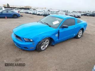 2010 Ford Mustang V6 with VIN 1ZVBP8AN9A5157640, listed as a IAAI auction lot 41873148 with 147,969 mi miles and . Bid and sale history available at carsss.com. Image 2.