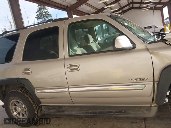 2005 GMC Yukon SLT with VIN 1GKEK13Z95R105420, listed as a IAAI auction lot 41680727 with 230,705 mi miles. Bid and sale history available at carsss.com. Image 13.