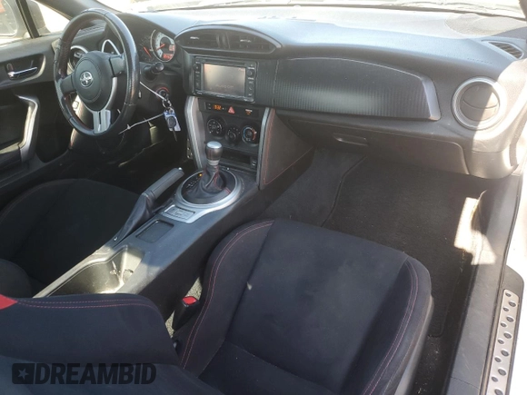 2014 Scion FR-S z VIN JF1ZNAA16E8702862, wystawiony jako Copart lot #57879575 z przebiegiem 101 775 mil mil oraz Szkoda całkowita • Salvage title. Historia ofert i sprzedaży dostępna na DreamBid. Obrazek 8.