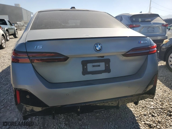2024 BMW i5 M60 with VIN WBY43FK07RCR13048, listed as a Copart auction lot 71660944 with 5,545 mi miles and Salvage Title. Bid and sale history available at carsss.com. Image 6.