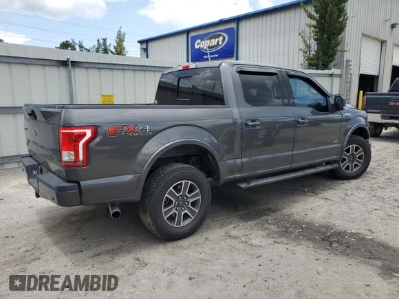 2015 Ford F-150 XLT with VIN 1FTEW1EG8FFC03207, listed as a Copart auction lot 59690515 with 261,153 mi miles and Salvage title. Bid and sale history available at DreamBid. Image 3.