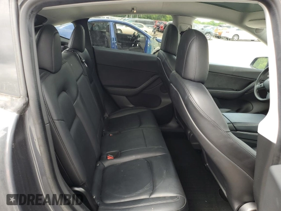 2021 Tesla Model Y Long Range z VIN 5YJYGDEE9MF067651, wystawiony jako Copart lot #55758165 z przebiegiem 61 348 mil mil oraz Czysty tytuł • Clean title. Historia ofert i sprzedaży dostępna na DreamBid. Obrazek 11.