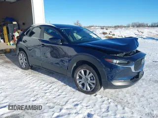 2022 Mazda CX-30 S Select with VIN 3MVDMBBL9NM448264, listed as a IAAI auction lot 41294686 with 9,324 mi miles and . Bid and sale history available at DreamBid. Image 1.