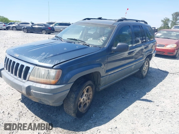 2000 Jeep Grand Cherokee Laredo with VIN 1J4G248S1YC416634, listed as a IAAI auction lot 42036197 with 140,596 mi miles and . Bid and sale history available at DreamBid. Image 2.