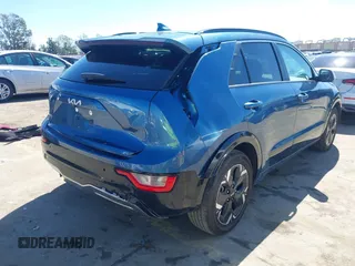 2023 Kia Niro Wind with VIN KNDCR3L19P5038753, listed as a IAAI auction lot 41750599 with 59,182 mi miles. Bid and sale history available at carsss.com. Image 4.