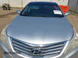 2012 Hyundai Azera z VIN KMHFH4JGXCA182208, wystawiony jako IAAI lot #42559319 z przebiegiem 236 086 mil mil oraz . Historia ofert i sprzedaży dostępna na DreamBid. Obrazek 21.