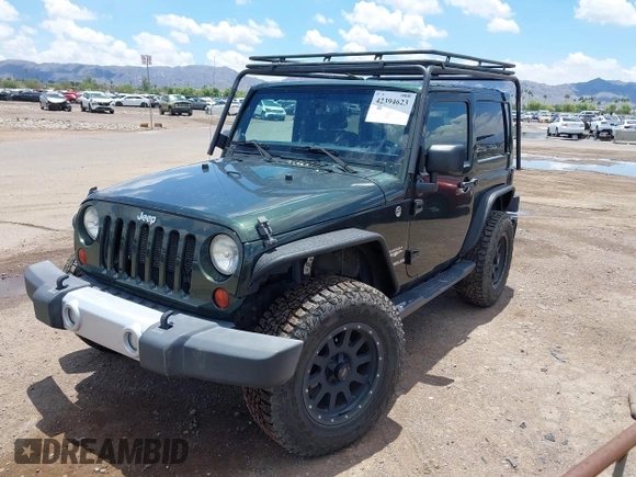 2012 Jeep Wrangler Sahara z VIN 1C4AJWBGXCL100527, wystawiony jako IAAI lot #42394623 z przebiegiem 126 097 mil mil oraz . Historia ofert i sprzedaży dostępna na DreamBid. Obrazek 17.