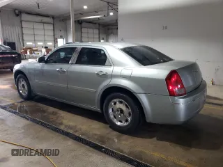 2005 Chrysler 300 with VIN 2C3JA53G65H556313, listed as a Copart auction lot 51839305 with 124,358 mi miles and Salvage Title. Bid and sale history available at carsss.com. Image 2.
