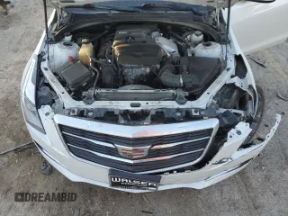 2018 Cadillac ATS AWD z VIN 1G6AE5RX3J0138669, wystawiony jako Copart lot #83647714 z przebiegiem 74 143 mil mil oraz Szkoda całkowita • Salvage title. Historia ofert i sprzedaży dostępna na DreamBid. Obrazek 11.