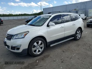 2014 Chevrolet Traverse LTZ z VIN 1GNKRJKD8EJ346892, wystawiony jako Copart lot #56036295 z przebiegiem 183 747 mil mil oraz Czysty tytuł • Clean title. Historia ofert i sprzedaży dostępna na DreamBid. Obrazek 1.