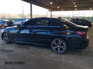 2021 BMW 3 Series M340i xDrive with VIN 3MW5U9J01M8B75976, listed as a IAAI auction lot 41664051 with 90,155 mi miles. Bid and sale history available at carsss.com. Image 3.