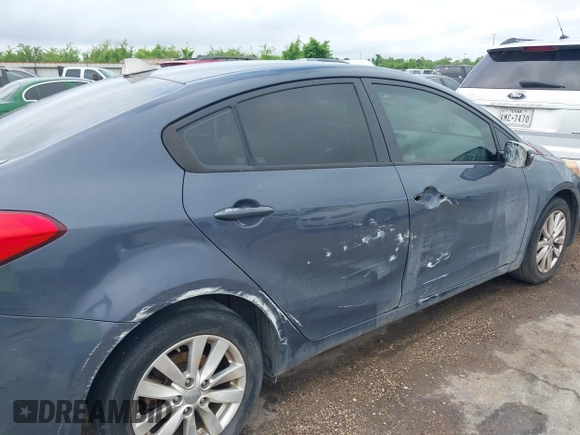 2014 Kia Forte LX with VIN KNAFX4A62E5221011, listed as a IAAI auction lot 42063598 with 187,649 mi miles. Bid and sale history available at carsss.com. Image 13.