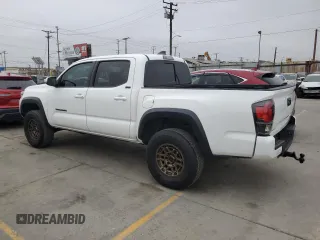 2023 Toyota Tacoma SR с VIN 3TYCZ5AN7PT114941, выставлен на аукционе Copart как лот 60172965 с пробегом 23 116 миль миль и Списание • Salvage title. История ставок и продаж доступна на DreamBid. Изображение 2.