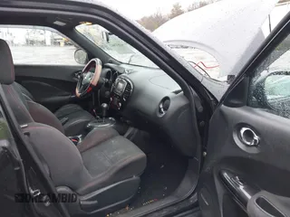 2014 Nissan Juke S with VIN JN8AF5MV7ET362861, listed as a IAAI auction lot 41832662 with 151,943 mi miles. Bid and sale history available at carsss.com. Image 5.