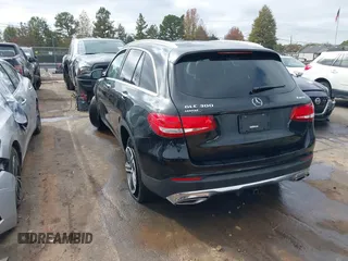 2016 Mercedes-Benz GLC with VIN WDC0G4KB9GF085925, listed as a IAAI auction lot 40804297 with 77,297 mi miles. Bid and sale history available at carsss.com. Image 3.