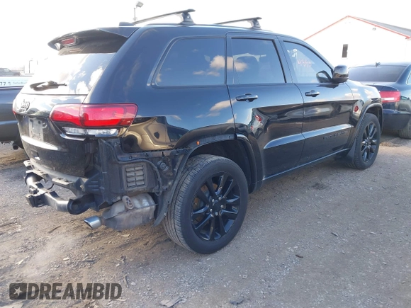 2017 Jeep Grand Cherokee Laredo with VIN 1C4RJEAG7HC953361, listed as a IAAI auction lot 41554390 with 98,099 mi miles and . Bid and sale history available at DreamBid. Image 4.