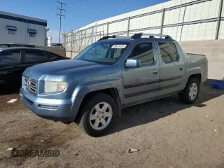 2006 Honda Ridgeline RTL with VIN 2HJYK16586H569670, listed as a Copart auction lot 60476975 with 190,534 mi miles and Salvage title. Bid and sale history available at DreamBid. Image 1.