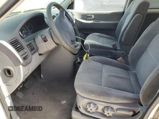2003 Kia Sedona LX with VIN KNDUP131236453481, listed as a Copart auction lot 75660244 with 125,628 mi miles and Salvage Title. Bid and sale history available at carsss.com. Image 7.