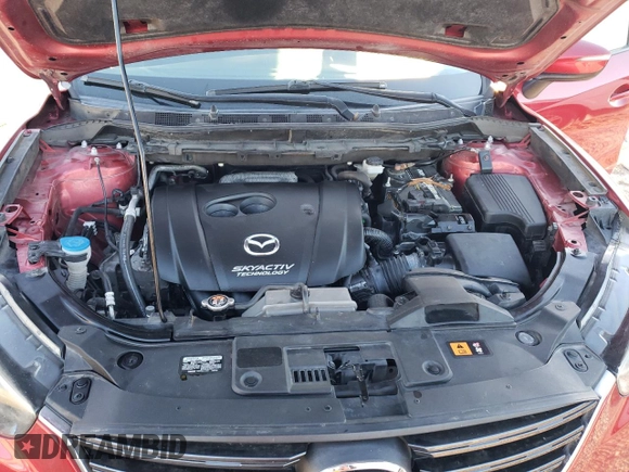 2016 Mazda CX-5 Sport with VIN JM3KE2BYXG0805613, listed as a Copart auction lot 86968884 with 114,524 mi miles and Clean Title. Bid and sale history available at carsss.com. Image 12.