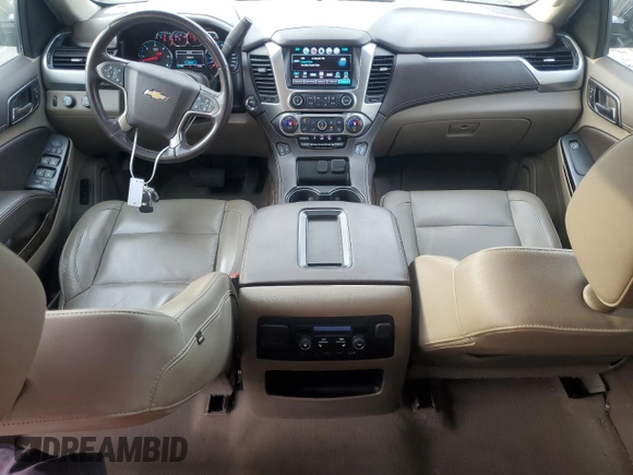 2019 Chevrolet Tahoe LT with VIN 1GNSKBKC2KR349527, listed as a Copart auction lot 58496695 with 128,590 mi miles and Salvage title. Bid and sale history available at DreamBid. Image 8.