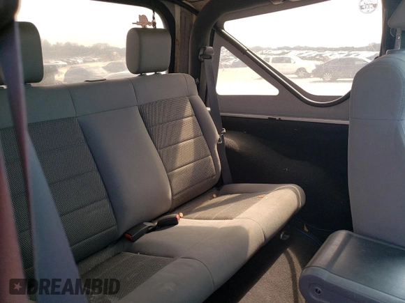 2008 Jeep Wrangler Sahara with VIN 1J4FA54148L561961, listed as a Copart auction lot 50770895 with 126,516 mi miles and Salvage title. Bid and sale history available at DreamBid. Image 12.