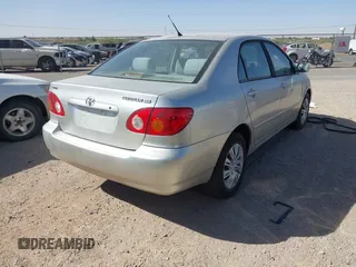 2004 Toyota Corolla CE with VIN 1NXBR32E64Z283247, listed as a IAAI auction lot 42121254 with 292,754 mi miles. Bid and sale history available at carsss.com. Image 4.