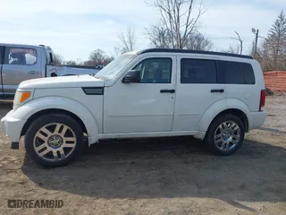 2007 Dodge Nitro R/T with VIN 1D8GU58687W720700, listed as a IAAI auction lot 41802485 with 203,575 mi miles. Bid and sale history available at carsss.com. Image 14.