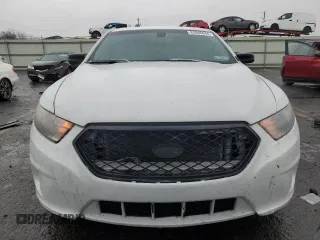 2014 Ford Police Interceptor with VIN 1FAHP2L83EG138213, listed as a Copart auction lot 83946044 with 130,742 mi miles and Salvage title. Bid and sale history available at DreamBid. Image 5.