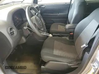2016 Jeep Compass Sport z VIN 1C4NJCBA9GD810594, wystawiony jako Copart lot #56961885 z przebiegiem 151 386 mil mil oraz Szkoda całkowita • Salvage title. Historia ofert i sprzedaży dostępna na DreamBid. Obrazek 7.