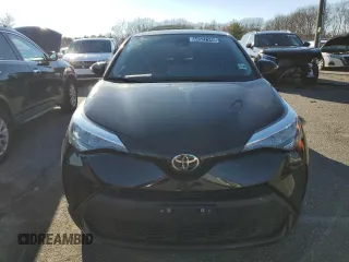 2021 Toyota C-HR LE z VIN NMTKHMBX5MR131252, wystawiony jako Copart lot #44527145 z przebiegiem 56 103 mil mil oraz Tytuł czysty. Historia ofert i sprzedaży dostępna na DreamBid. Obrazek 5.
