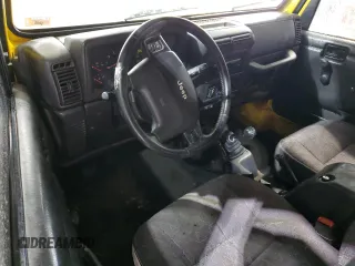 2002 Jeep Wrangler Sport z VIN 1J4FA49S02P730417, wystawiony jako Copart lot #59620865 z przebiegiem Nie podano mil oraz Szkoda całkowita • Salvage title. Historia ofert i sprzedaży dostępna na DreamBid. Obrazek 8.