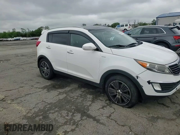 2015 Kia Sportage EX with VIN KNDPCCAC9F7692369, listed as a Copart auction lot 58847895 with 250,000 mi miles and Salvage title. Bid and sale history available at DreamBid. Image 13.