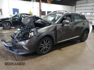 2016 Mazda CX-3 Grand Touring z VIN JM1DKBD73G0114924, wystawiony jako Copart lot #52451715 z przebiegiem 89 074 mil mil oraz Szkody całkowita. Historia ofert i sprzedaży dostępna na DreamBid. Obrazek 1.