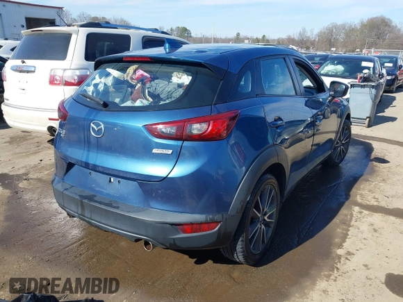 2018 Mazda CX-3 Touring z VIN JM1DKFC73J0301449, wystawiony jako IAAI lot #41678604 z przebiegiem 105 249 mil mil oraz . Historia ofert i sprzedaży dostępna na DreamBid. Obrazek 4.