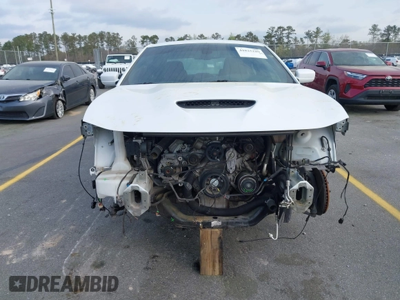 2020 Dodge Charger R/T with VIN 2C3CDXCT1LH199869, listed as a IAAI auction lot 41825189 with 116,077 mi miles and . Bid and sale history available at carsss.com. Image 13.