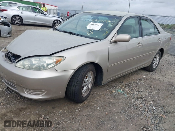2005 Toyota Camry LE with VIN 4T1BF32K05U093461, listed as a IAAI auction lot 41947197 with 127,630 mi miles and . Bid and sale history available at DreamBid. Image 2.
