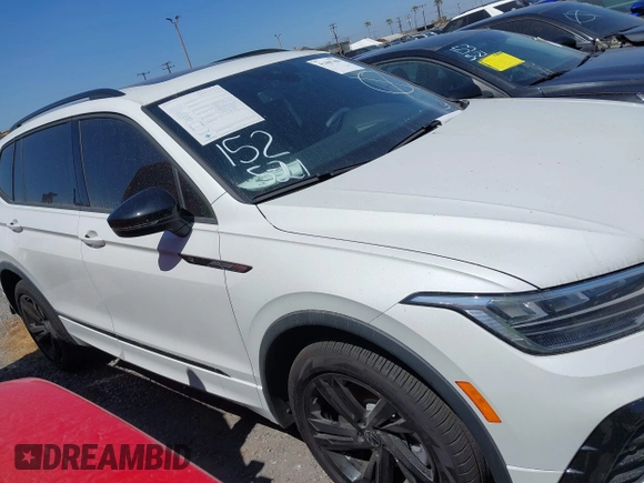 2024 Volkswagen Tiguan SE R-Line Black with VIN 3VVCB7AX1RM064314, listed as a IAAI auction lot 41465386 with 7,626 mi miles and . Bid and sale history available at DreamBid. Image 14.