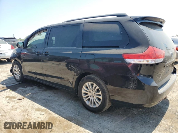 2013 Toyota Sienna XLE AAS с VIN 5TDYK3DC1DS349139, выставлен на аукционе Copart как лот 64239914 с пробегом 127 874 миль миль и Списание • Salvage title. История ставок и продаж доступна на DreamBid. Изображение 2.