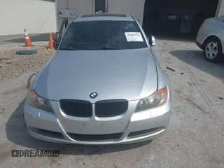 2007 BMW 3 Series 328xi with VIN WBAVC93597K034927, listed as a IAAI auction lot 42009274 with 184,427 mi miles and . Bid and sale history available at DreamBid. Image 13.