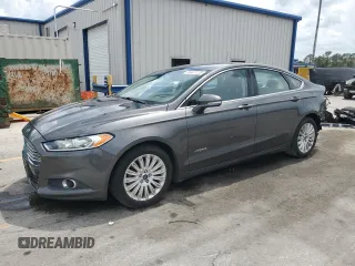 2015 Ford Fusion SE Hybrid with VIN 3FA6P0LUXFR220930, listed as a Copart auction lot 58407235 with 179,682 mi miles and Salvage title. Bid and sale history available at DreamBid. Image 1.