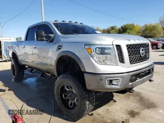 2017 Nissan Titan XD SV with VIN 1N6BA1F4XHN521471, listed as a Copart auction lot 76291024 with 100,447 mi miles and Salvage Title. Bid and sale history available at carsss.com. Image 4.