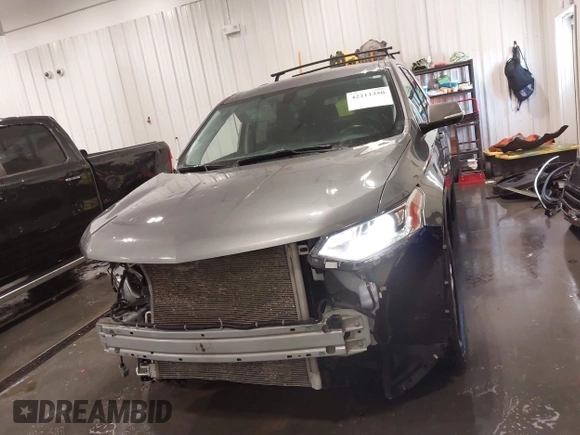 2020 Chevrolet Traverse LT with VIN 1GNEVHKW9LJ176834, listed as a IAAI auction lot 42211350 with 100,188 mi miles and . Bid and sale history available at DreamBid. Image 13.