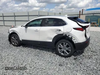 2021 Mazda CX-30 Premium z VIN 3MVDMADM5MM228747, wystawiony jako Copart lot #51747475 z przebiegiem 13 562 mil mil oraz Nie do naprawy • Non repairable. Historia ofert i sprzedaży dostępna na DreamBid. Obrazek 2.
