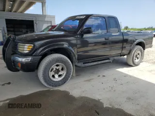 1999 Toyota Tacoma PreRunner z VIN 4TASN92N5XZ431412, wystawiony jako Copart lot #52282115 z przebiegiem 379 987 mil mil oraz Czysty tytuł • Clean title. Historia ofert i sprzedaży dostępna na DreamBid. Obrazek 1.