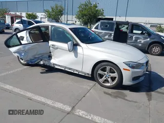 2014 BMW 3 Series 320i with VIN WBA3B1G50ENN90657, listed as a IAAI auction lot 42304612 with 129,377 mi miles and . Bid and sale history available at DreamBid. Image 1.