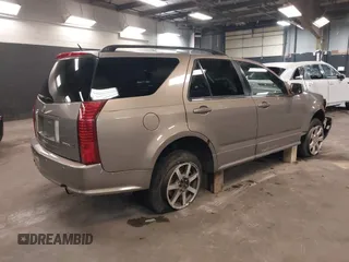 2007 Cadillac SRX with VIN 1GYEE637370137893, listed as a IAAI auction lot 41869395 with 215,460 mi miles. Bid and sale history available at carsss.com. Image 4.
