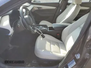 2019 Mazda 3 Premium with VIN JM1BPBEMXK1119599, listed as a Copart auction lot 71036504 with 61,371 mi miles and Salvage Title. Bid and sale history available at DreamBid. Image 7.