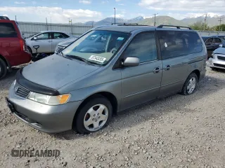2001 Honda Odyssey EX z VIN 2HKRL18691H571178, wystawiony jako Copart lot #57343205 z przebiegiem 198 506 mil mil oraz Czysty tytuł • Clean title. Historia ofert i sprzedaży dostępna na DreamBid. Obrazek 1.