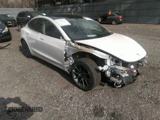 2020 Tesla Model 3 Standard Range Plus with VIN 5YJ3E1EA4LF792830, listed as a IAAI auction lot 41852919 with 76,461 mi miles. Bid and sale history available at carsss.com. Image 1.